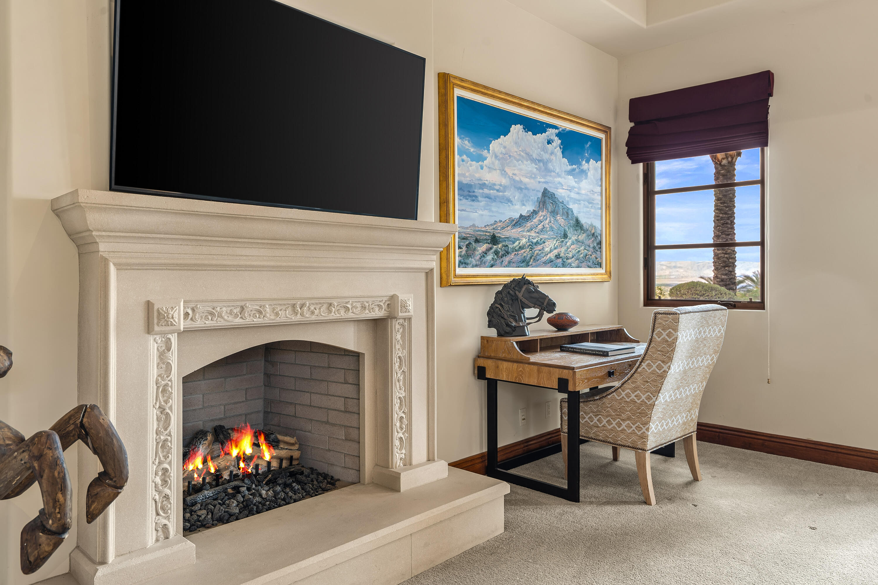 31 Hillcrest Drive Rancho Mirage, CA 92270 - Photo 45 of 82 a living room with furniture a fireplace and a flat screen tv