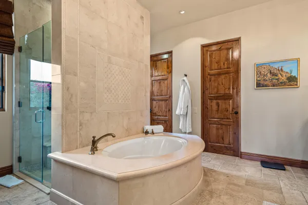 a kitchen with granite countertop a stove and a sink