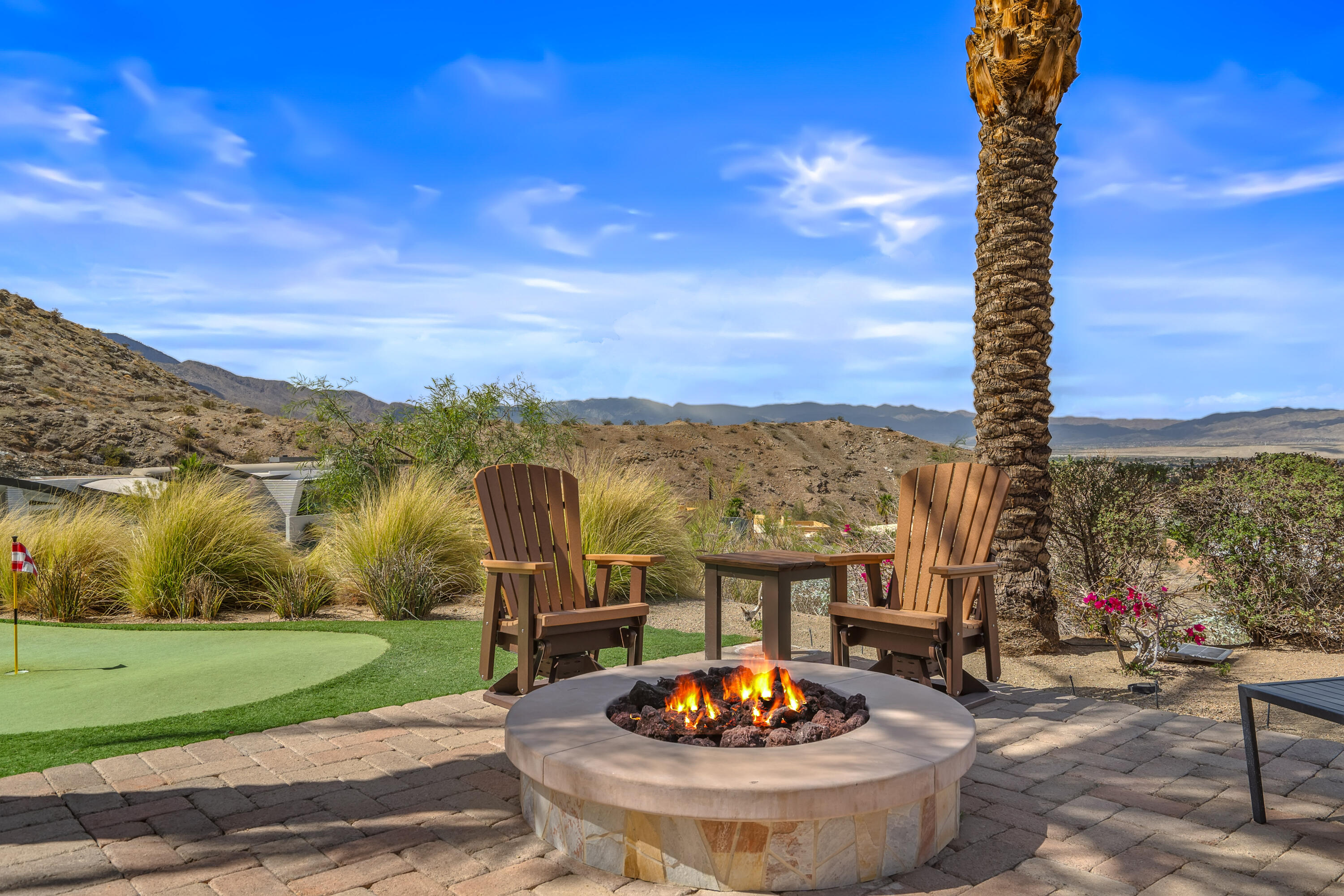 31 Hillcrest Drive Rancho Mirage, CA 92270 - Photo 7 of 82 a view of a patio with a table and chairs and potted plants