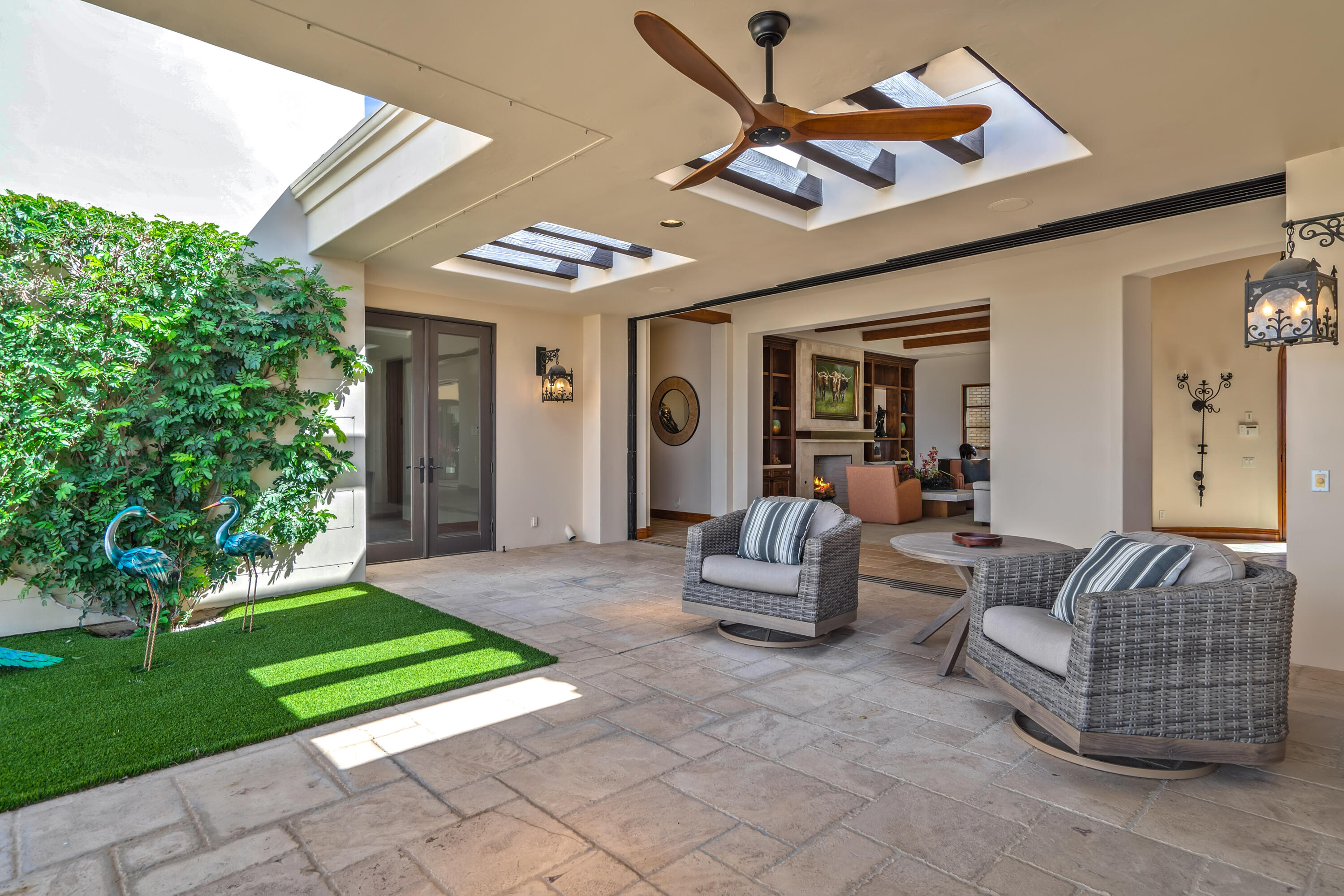 31 Hillcrest Drive Rancho Mirage, CA 92270 - Photo 72 of 82 a view of living room filled with furniture and a yard