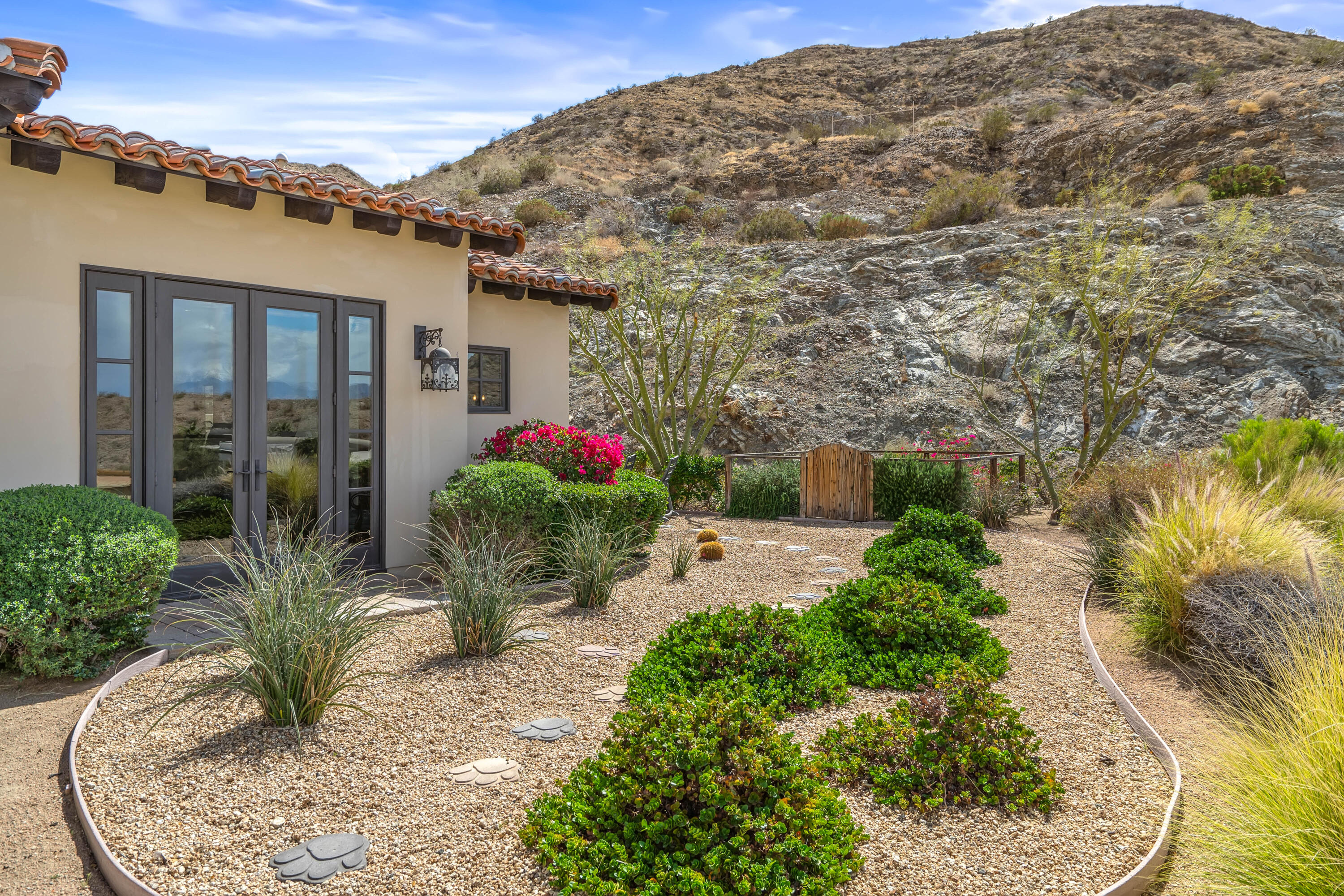 31 Hillcrest Drive Rancho Mirage, CA 92270 - Photo 80 of 82 a view of a garden with potted plants