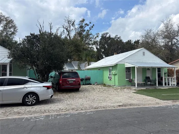 a car parked in front of a house