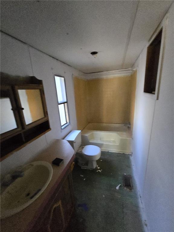 211 Waycross Road Savannah, GA 31419 - Photo 7 of 8 a bathroom with a sink toilet and mirror