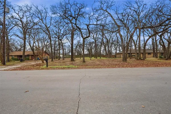 a view of road with trees