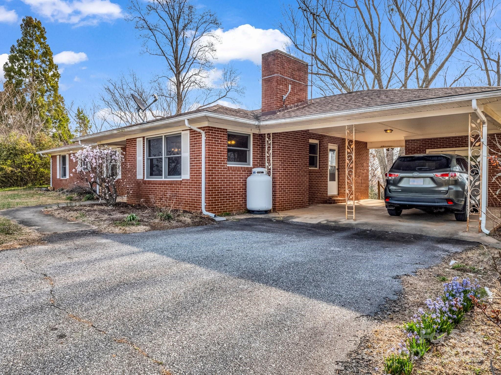 6 Rachel Bell Road Mill Spring, NC 28756 - Photo 12 of 39 a view of a car in front of house