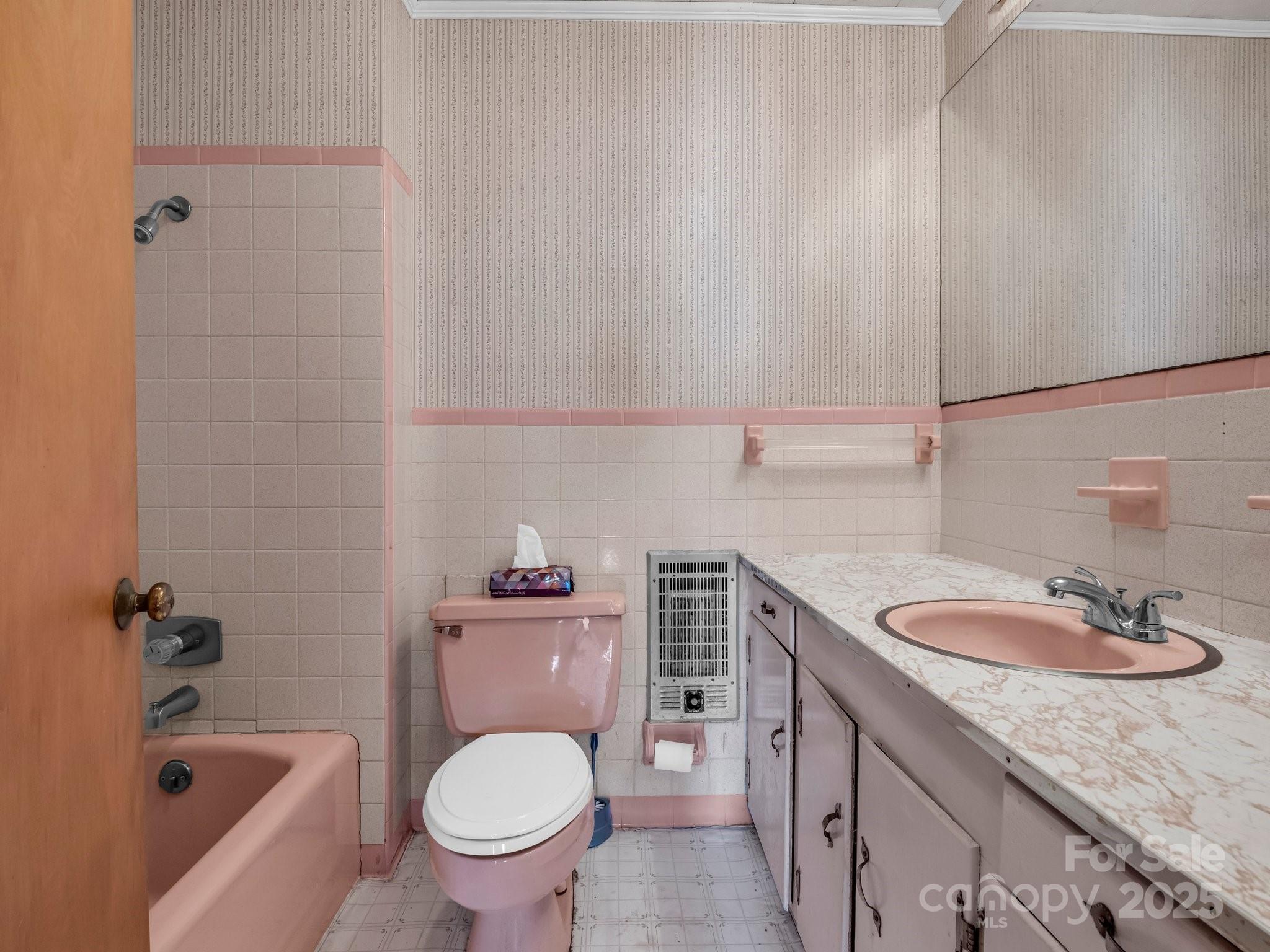 6 Rachel Bell Road Mill Spring, NC 28756 - Photo 26 of 39 a bathroom with a granite countertop sink a toilet and bathtub