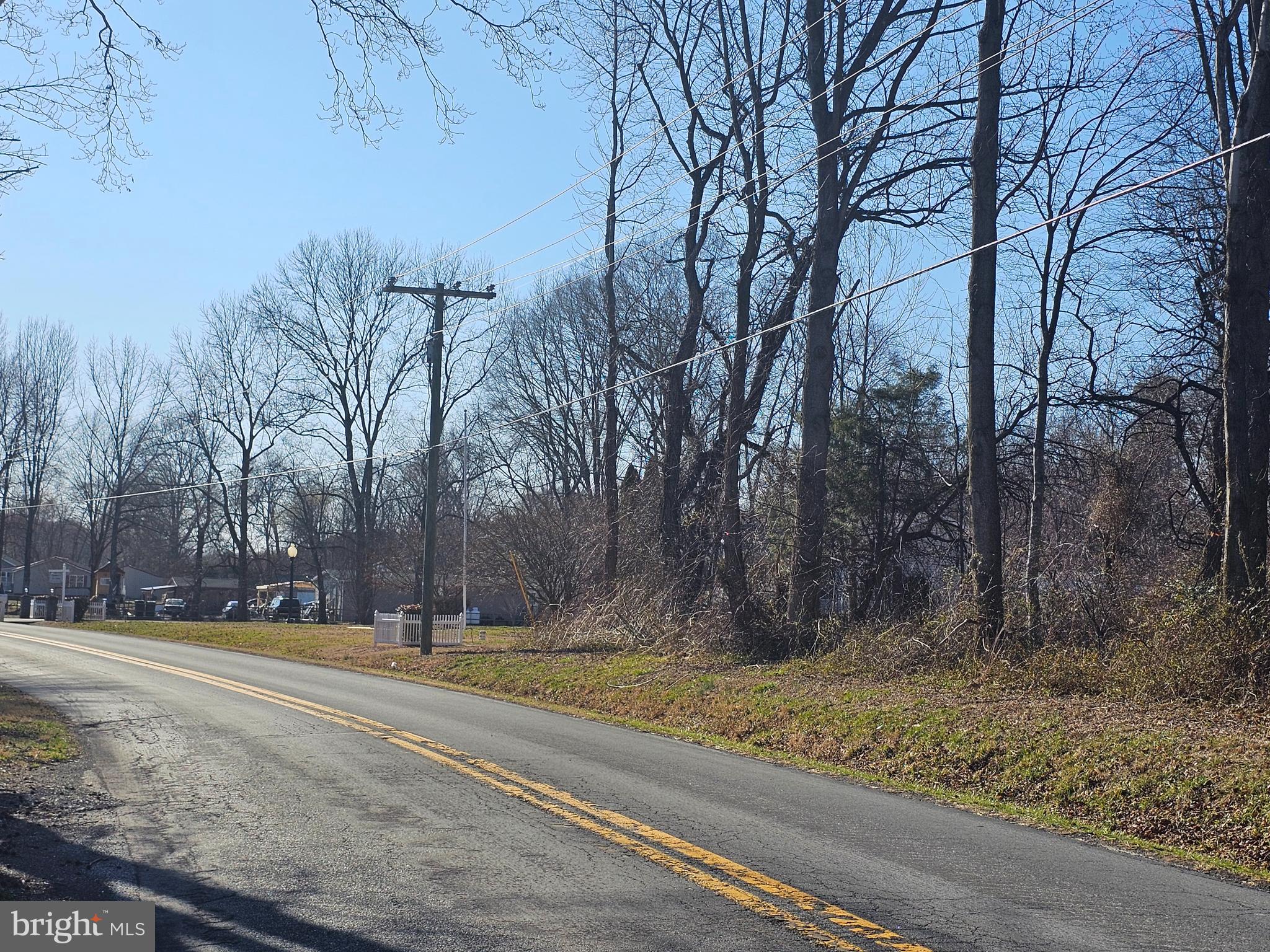 Fords Corner Road Clayton, DE 19938 - Photo 5 of 8 a view of a yard with large trees