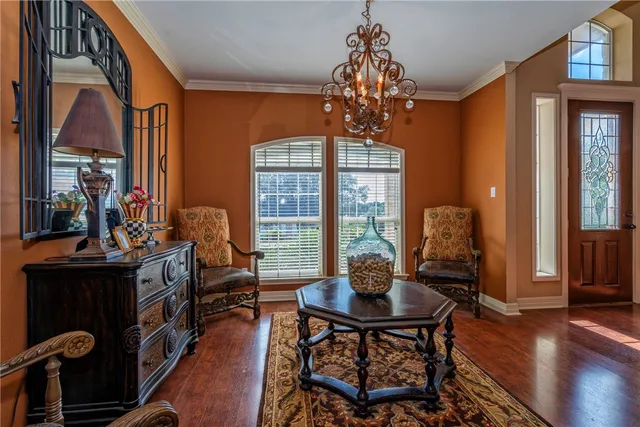 a view of a livingroom with furniture and window