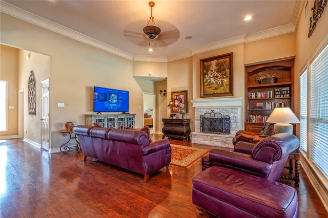 a living room with furniture or couch and a fireplace
