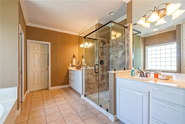 a bathroom with a sink a light fixture and a mirror