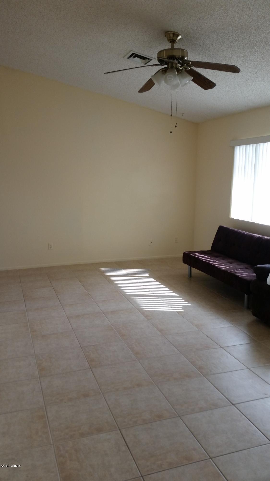 1840 West Utopia Road Phoenix, AZ 85027 - Photo 16 of 22 Living Room with All Tile