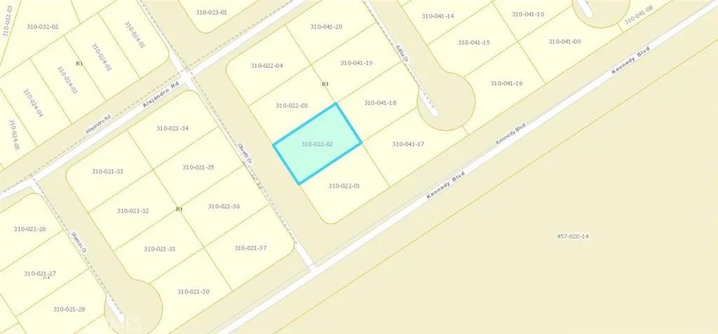 107 Olivetti Street Edwards, CA 93523 - Photo 2 of 13 close up of a white wall