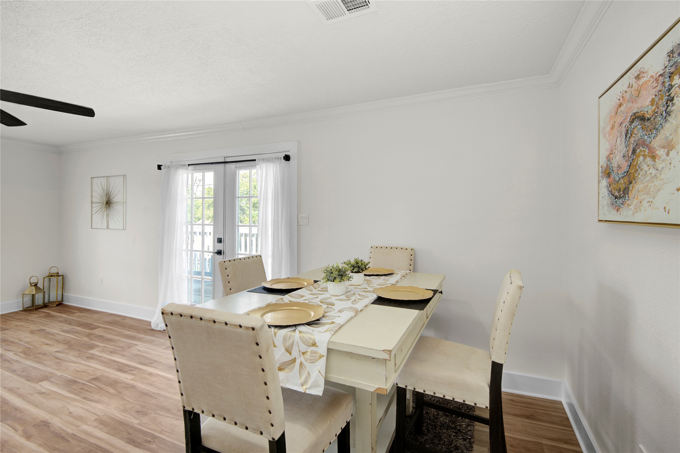 4909 Cochran Street, Unit 12 Houston, TX 77009 - Photo 14 of 29 a view of a dining room with furniture and wooden floor