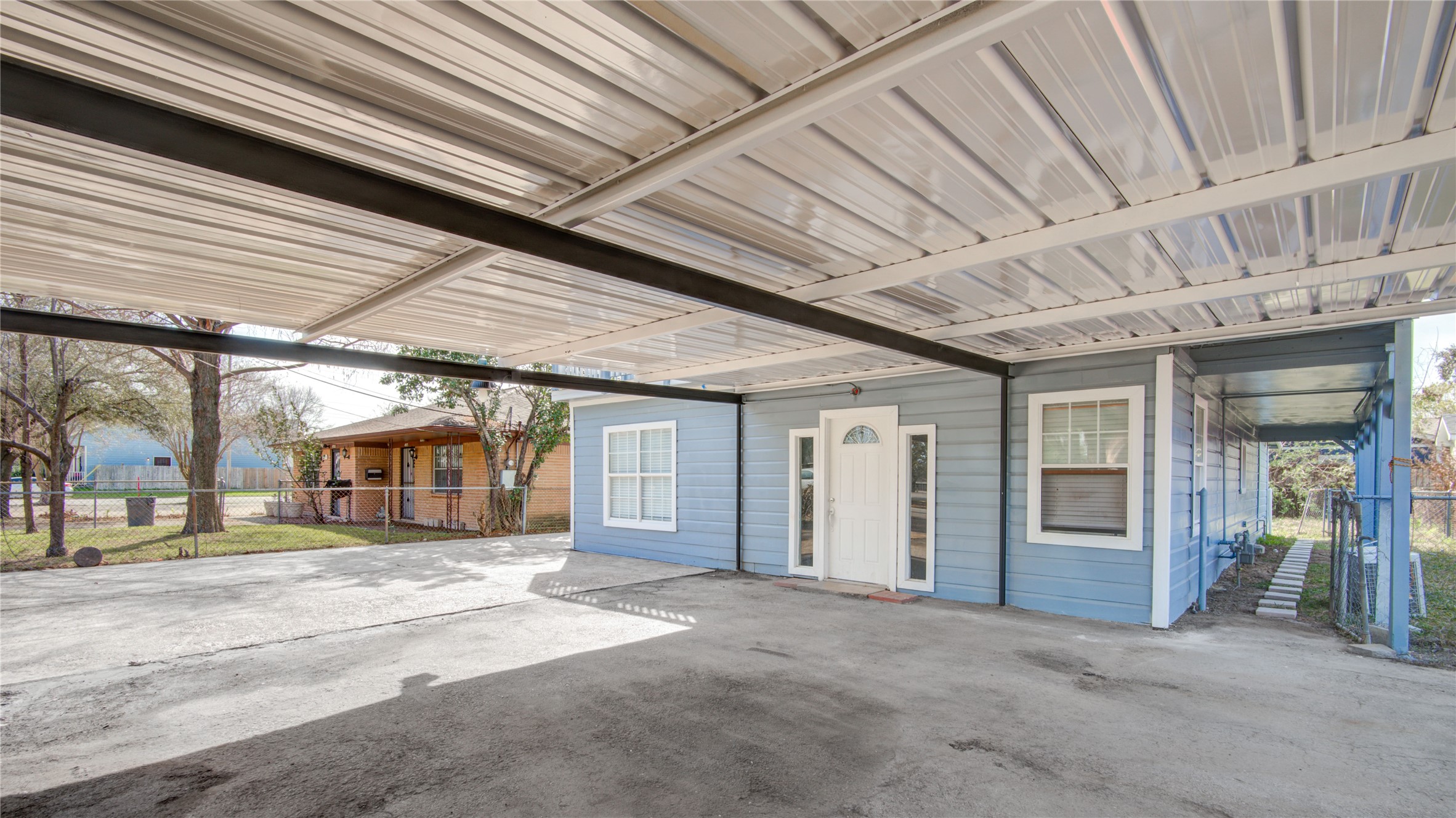 4909 Cochran Street, Unit 12 Houston, TX 77009 - Photo 29 of 29 a view of a building with door