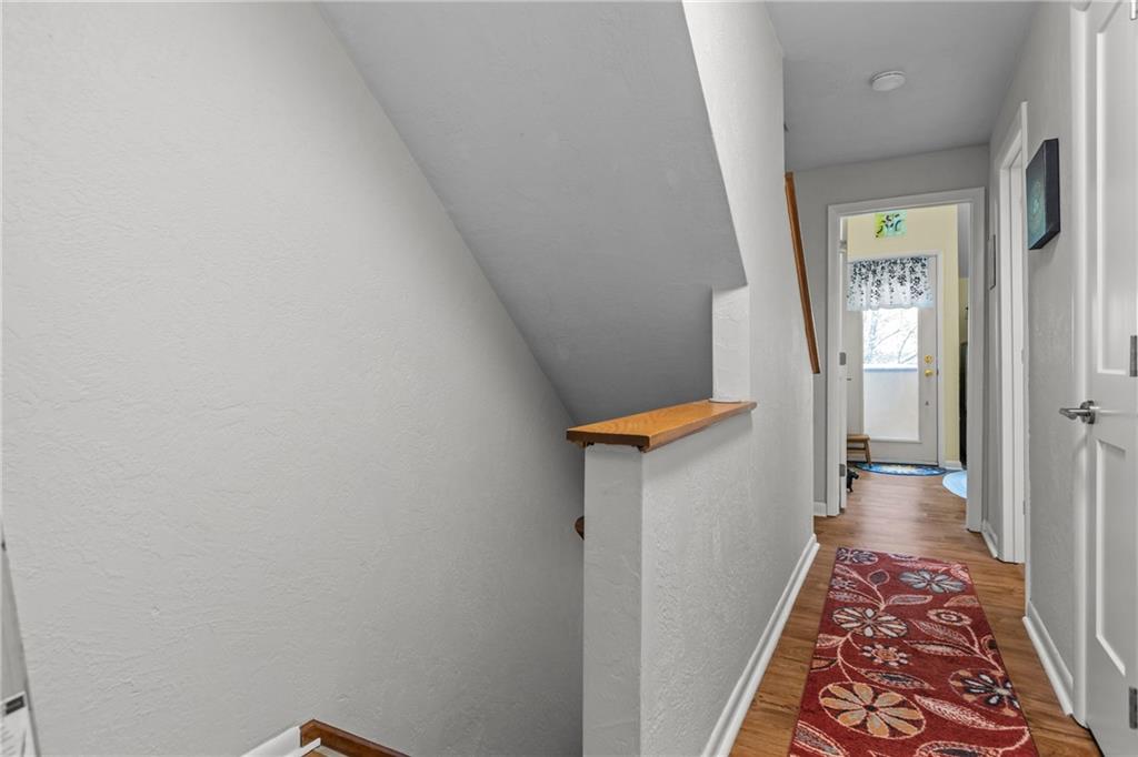 1104 West Ridge Road Allison Park, PA 15101 - Photo 18 of 32 a view of hallway with stairs and a rug