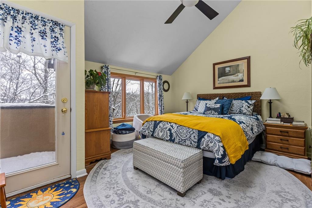 1104 West Ridge Road Allison Park, PA 15101 - Photo 21 of 32 a bedroom with a bed and wooden floor