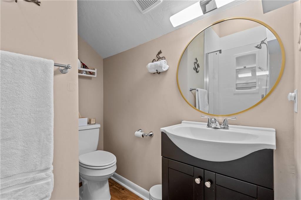 1104 West Ridge Road Allison Park, PA 15101 - Photo 24 of 32 a bathroom with a sink mirror and toilet