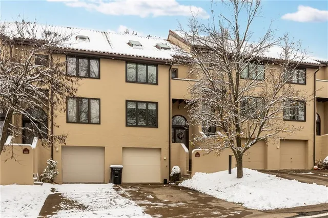 a view of a house with a snow