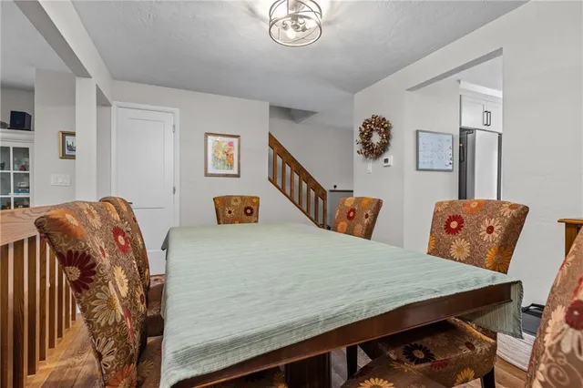 a bedroom with furniture and a chandelier
