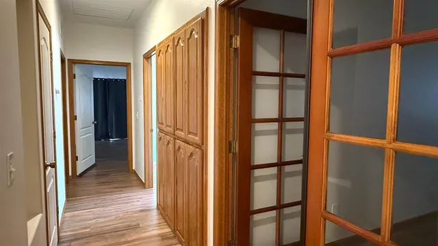 a view of a balcony from a hallway