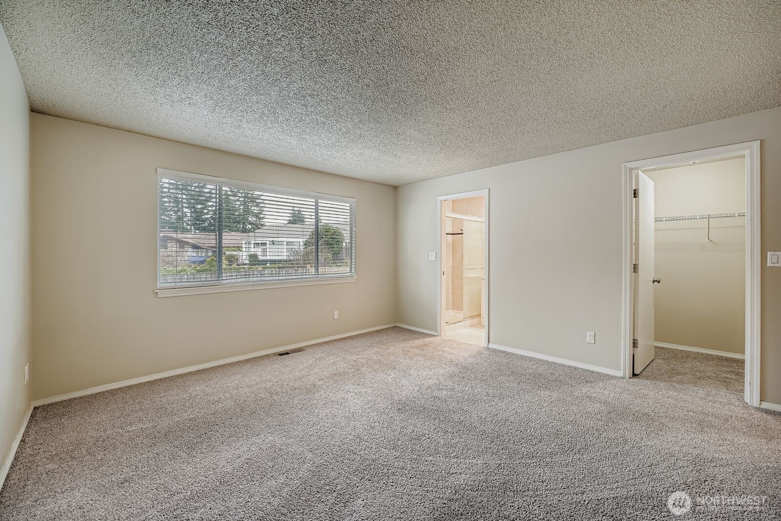 2738 Southwest 323rd Street Federal Way, WA 98023 - Photo 12 of 26 an empty room with windows and closet