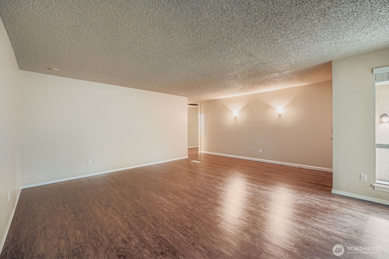 2738 Southwest 323rd Street Federal Way, WA 98023 - Photo 5 of 26 a view of an empty room and wooden floor