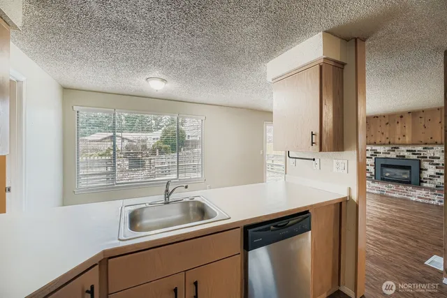 a close view of sink and cabinets