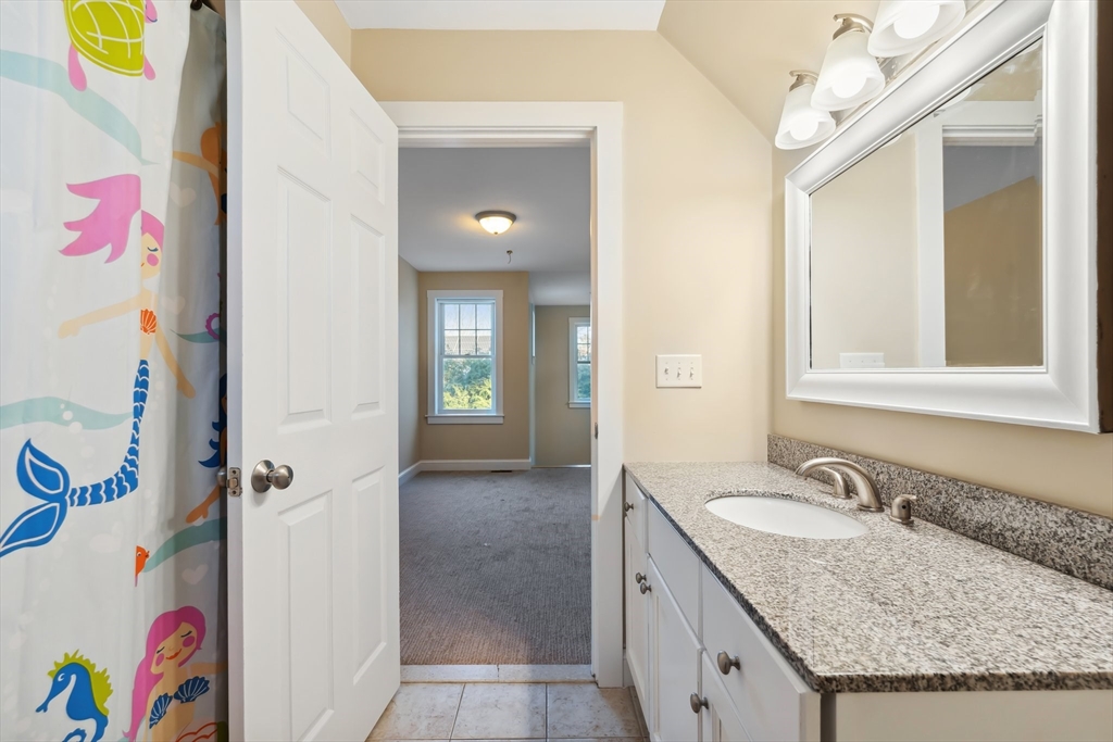 2 Pine Cone Lane East Freetown, MA 02717 - Photo 26 of 38 a bathroom with a granite countertop sink a mirror and a shower