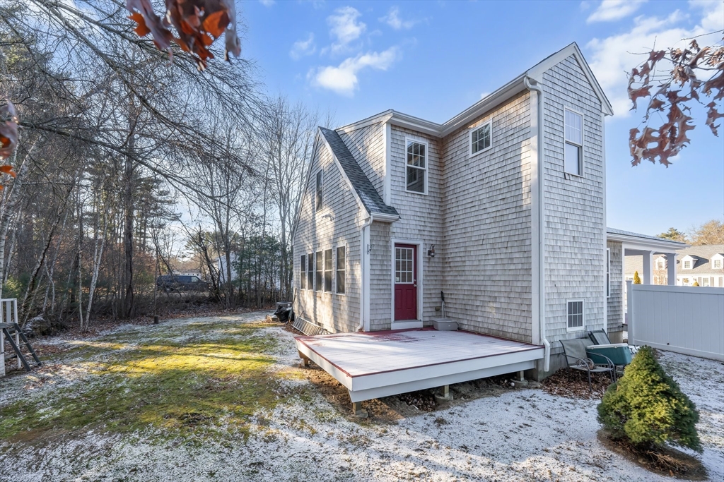 2 Pine Cone Lane East Freetown, MA 02717 - Photo 33 of 38 a front view of a house with a yard balcony