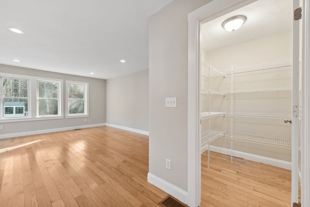 2 Pine Cone Lane East Freetown, MA 02717 - Photo 10 of 38 a view of empty room with wooden floor and fan
