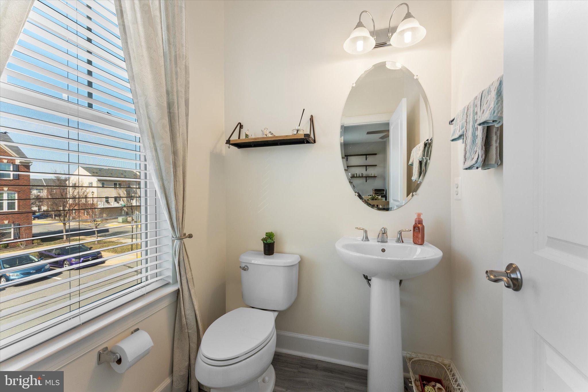 7075 Mongoose Trail Gainesville, VA 20155 - Photo 12 of 54 a bathroom with a sink toilet and shower