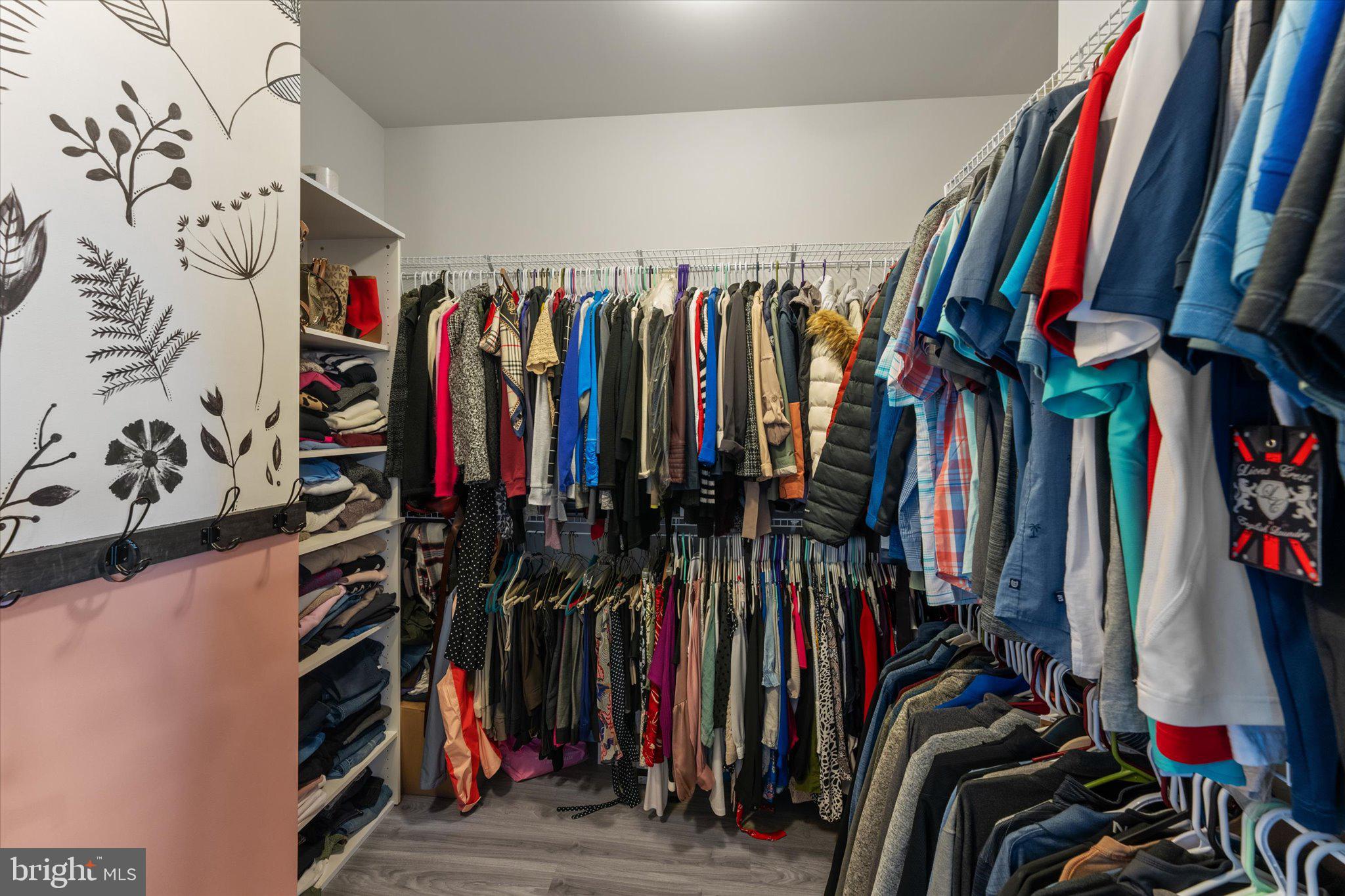 7075 Mongoose Trail Gainesville, VA 20155 - Photo 24 of 54 a view of walk in closet with clothes
