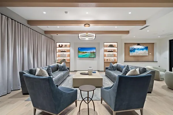 a living room filled with furniture and furniture