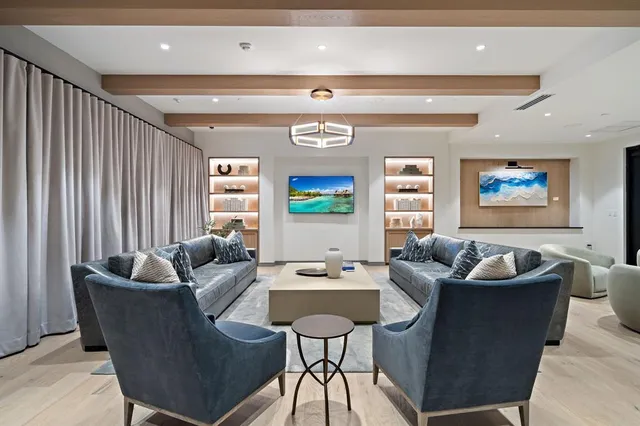 a living room filled with furniture and furniture