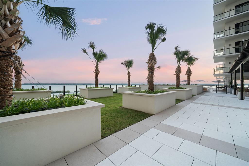 3111 Sunset Boulevard, Unit 1409 Flower Mound, TX 75022 - Photo 29 of 37 a view of a swimming pool with a yard