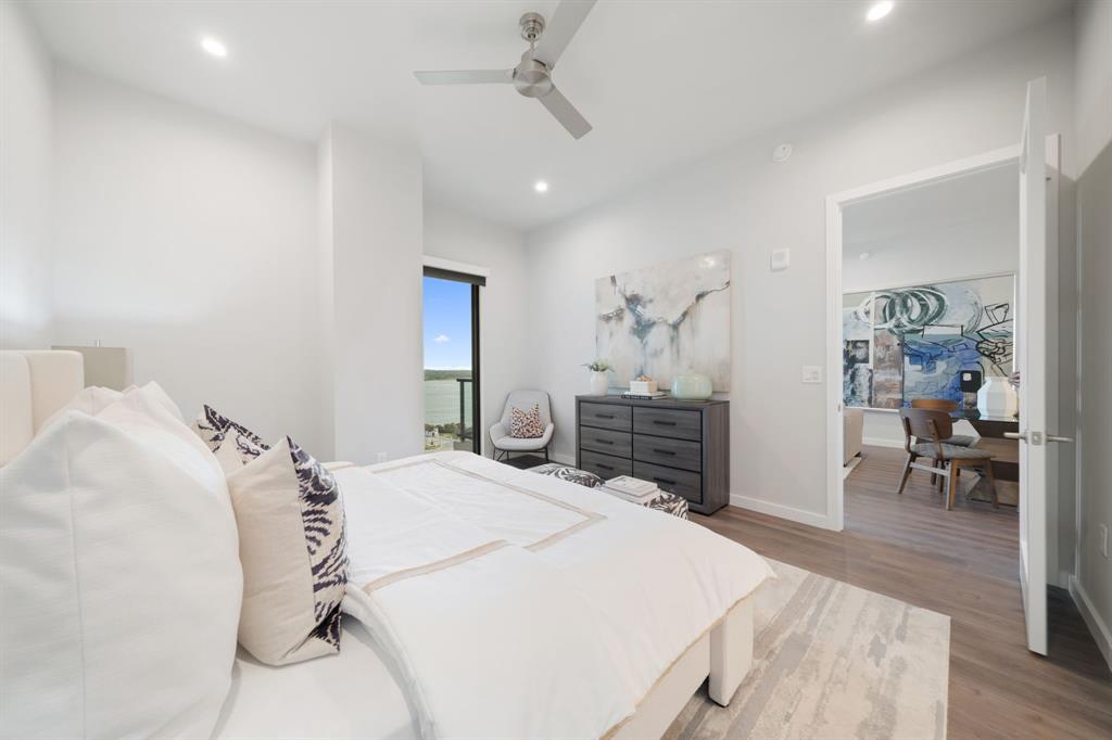 3111 Sunset Boulevard, Unit 1409 Flower Mound, TX 75022 - Photo 6 of 37 a spacious bedroom with a bed and dresser