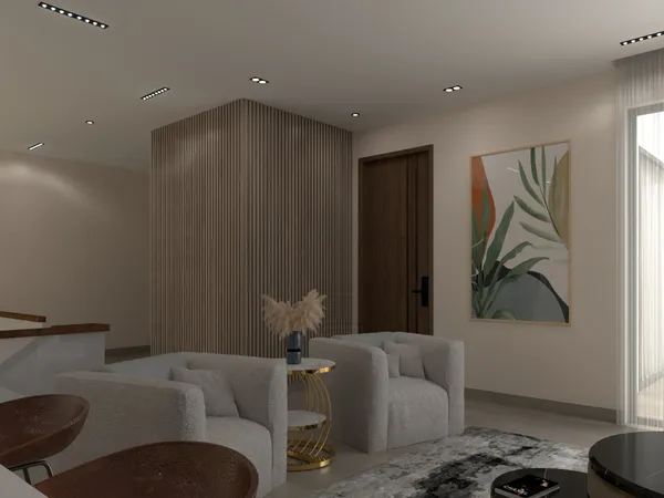 a living room with furniture and potted plant