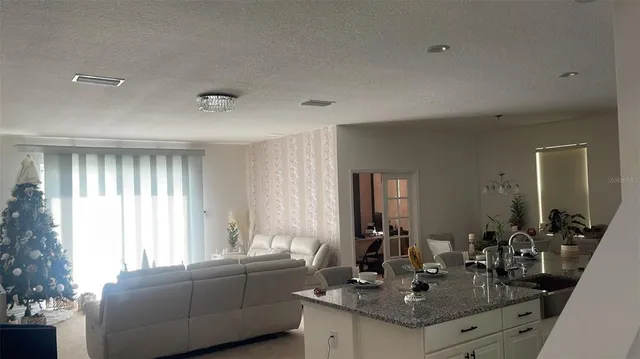 a bedroom with a bed and a desk