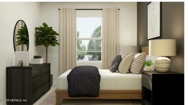 a bedroom with a bed and a mirror