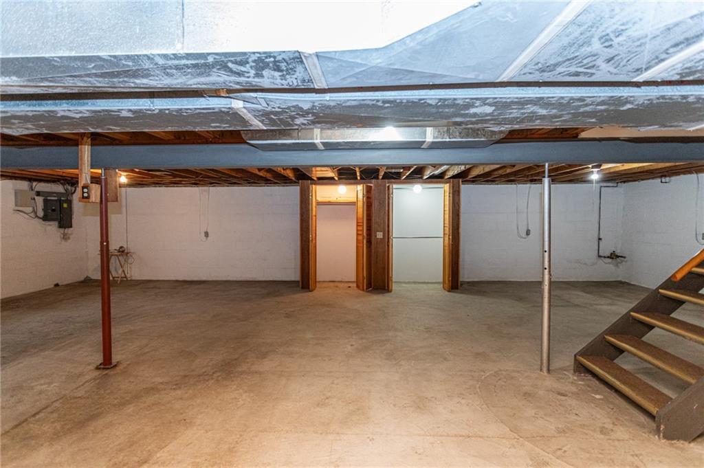 673 Vanderbilt Road Connellsville, PA 15425 - Photo 25 of 28 a view of a room with gym equipment