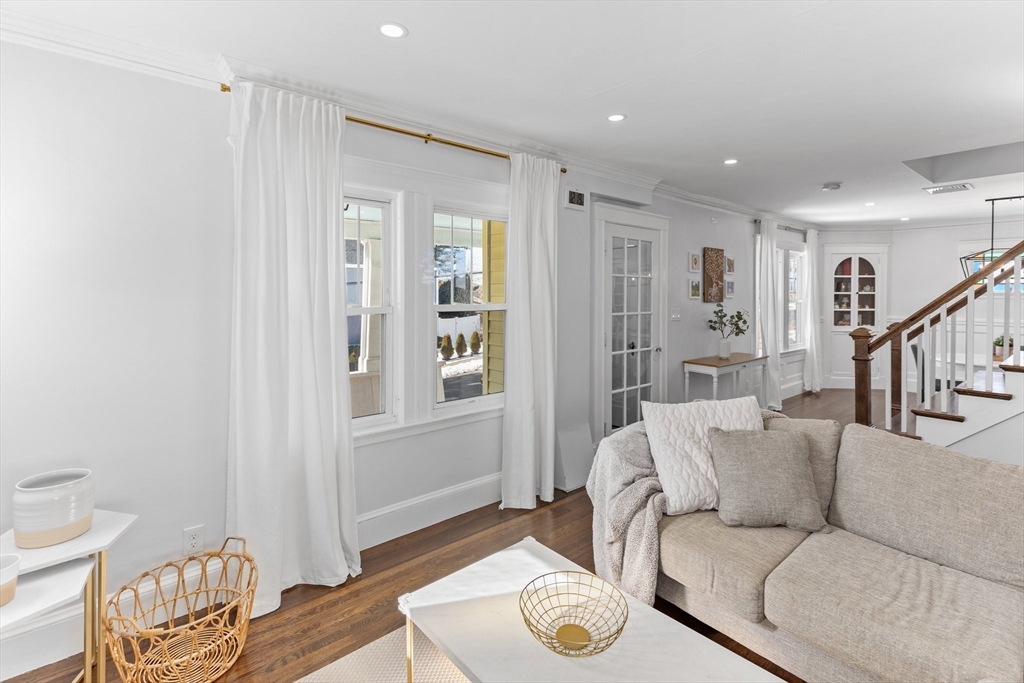 7 Cedar Terrace Milton, MA 02186 - Photo 14 of 34 a living room with furniture and a table