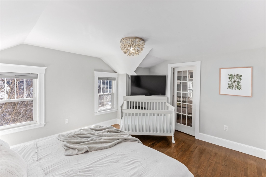 7 Cedar Terrace Milton, MA 02186 - Photo 20 of 34 a bedroom with a bed and a window