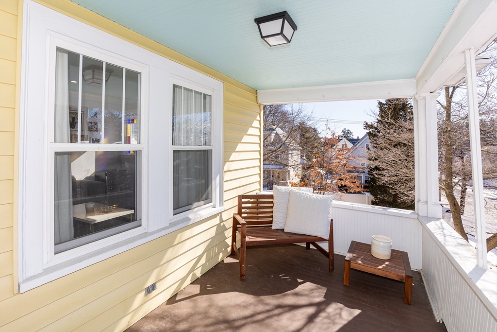 7 Cedar Terrace Milton, MA 02186 - Photo 4 of 34 a room with wooden floor and furniture
