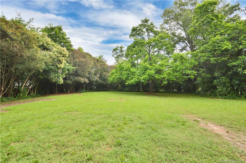 1297 Pinewood Road Rock Hill, SC 29730 - Photo 15 of 15 a view of a field with a trees