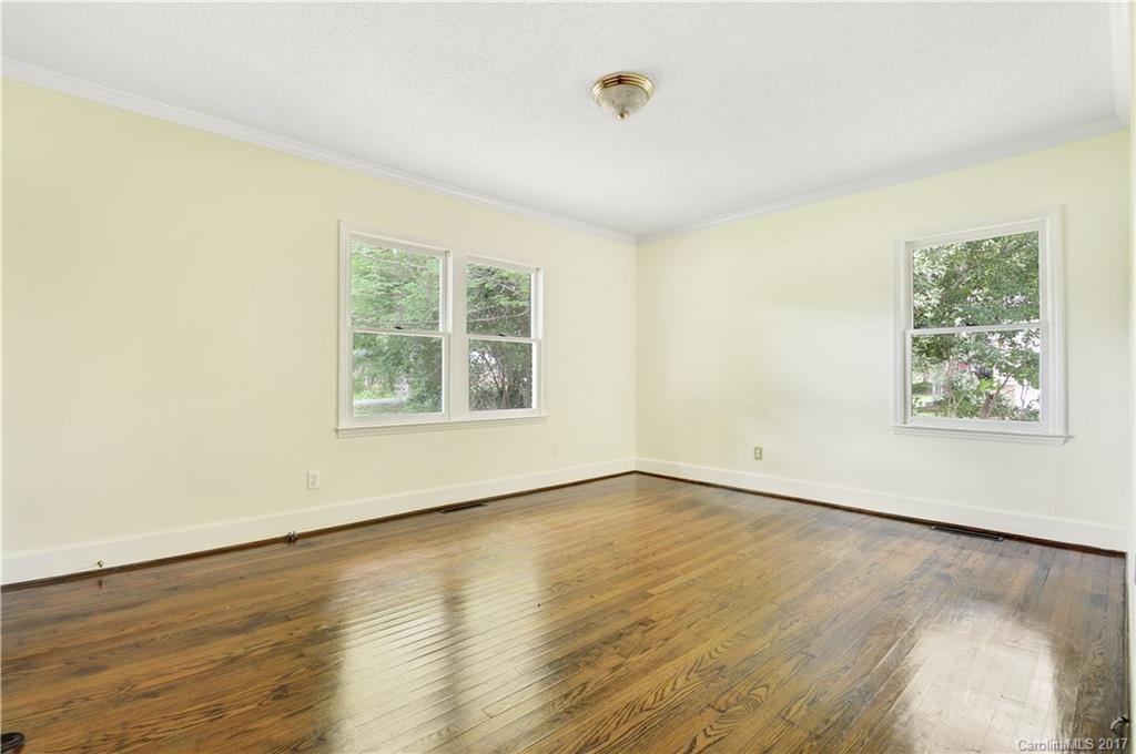 1297 Pinewood Road Rock Hill, SC 29730 - Photo 6 of 15 wooden floor in an empty room with a window
