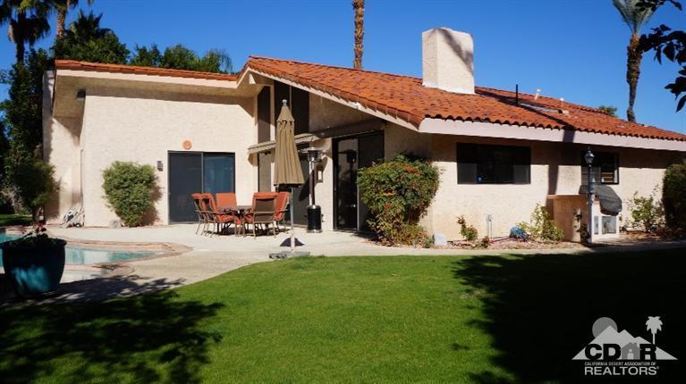2 Lincoln Place Rancho Mirage, CA 92270 - Photo 22 of 25 a view of a house with backyard sitting area and garden