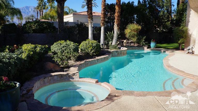 2 Lincoln Place Rancho Mirage, CA 92270 - Photo 23 of 25 a view of a swimming pool with a sitting area