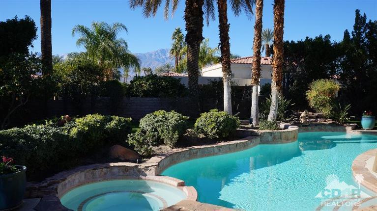 2 Lincoln Place Rancho Mirage, CA 92270 - Photo 24 of 25 a view of a garden with a fountain