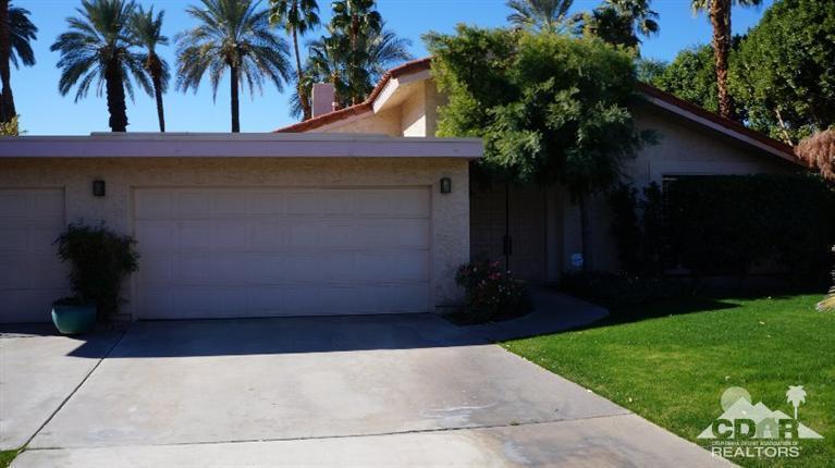 2 Lincoln Place Rancho Mirage, CA 92270 - Photo 3 of 25 a front view of a house with a yard