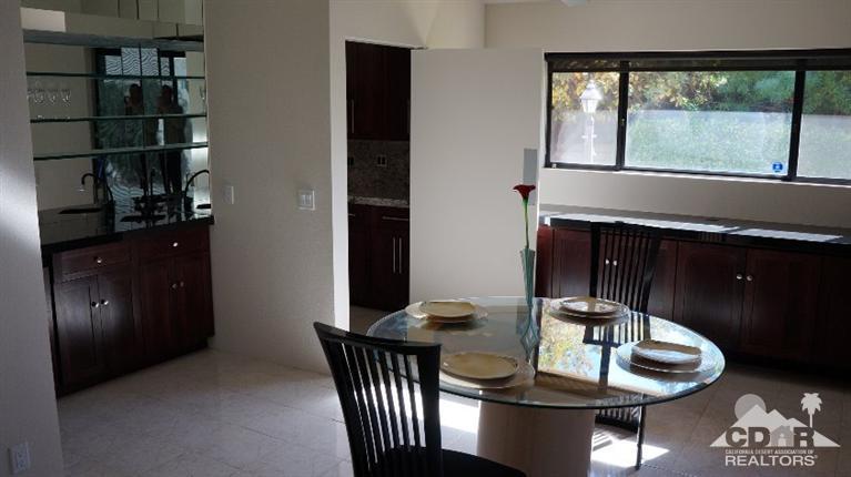2 Lincoln Place Rancho Mirage, CA 92270 - Photo 8 of 25 a dining room with furniture and window
